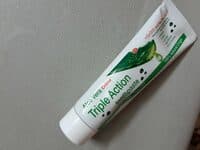 Triple action toothpaste