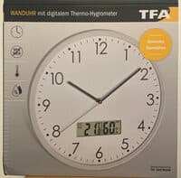 Wall clock with digital thermo-hygrometer