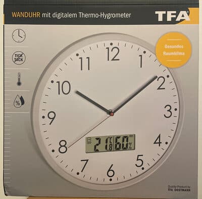 Wall clock with digital thermo-hygrometer