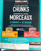 Canned food for cats made with real chicken or salmon two flavor variety chunks in gravy
